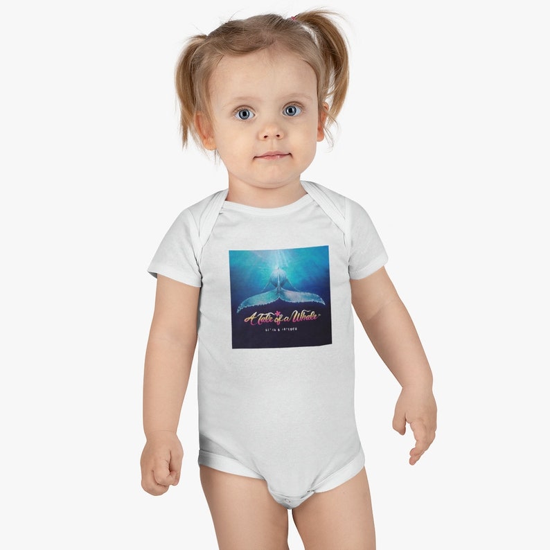 A tale of a whale onesie baby